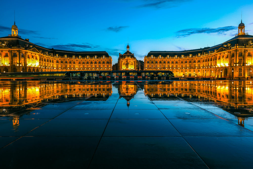 Reflection of Place De La Bourse and tram in Bordeaux, France. A Unesco World Heritage